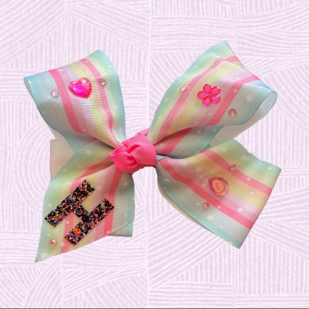 ✨ Handcrafted 5 inch hair bow with glitter letter “H” 💝